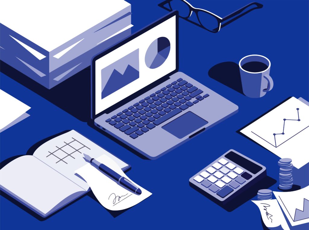Laptop displaying financial charts beside bookkeeping tools, calculator, and business documents on a blue workspace. 